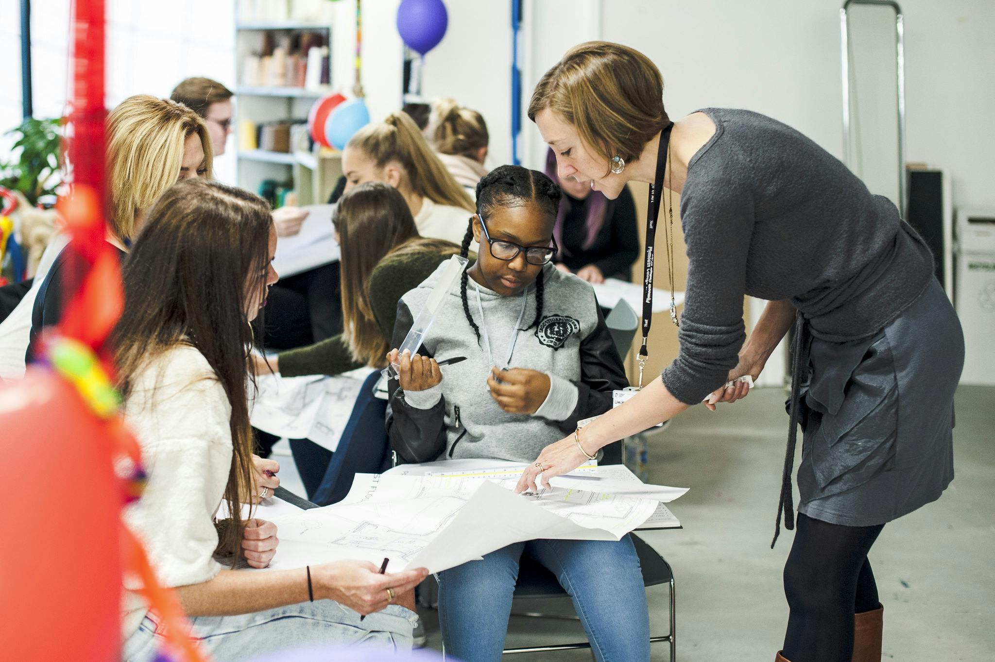 Interiors Course Leader and Senior Lecturer Cathryn Bishop chats to students