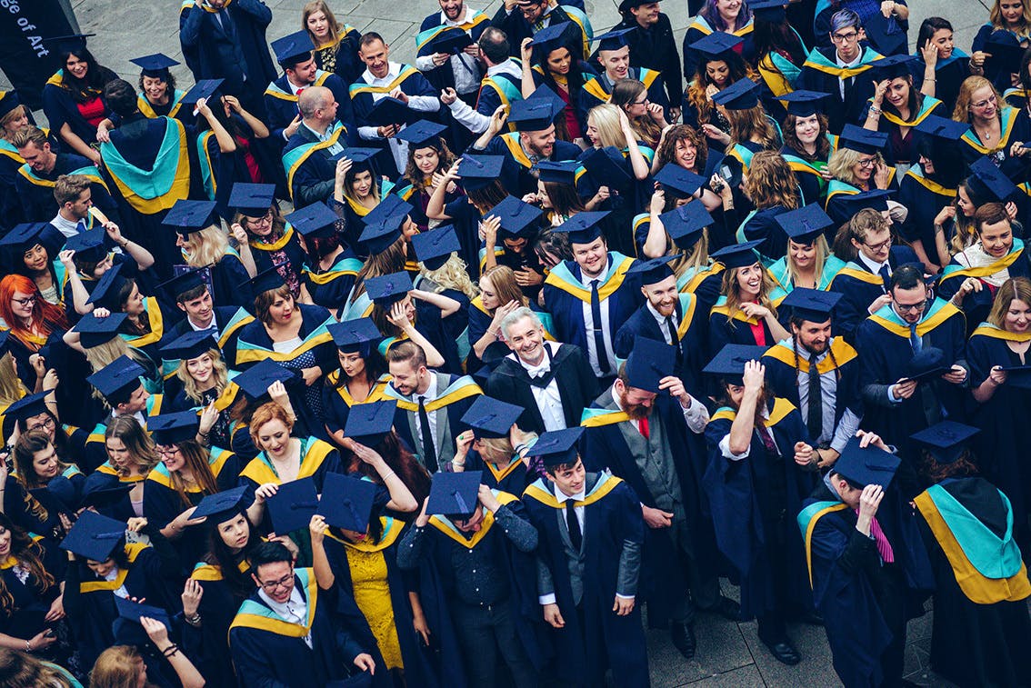 Students celebrate with a group photograph at our 2016 Graduation Ceremony